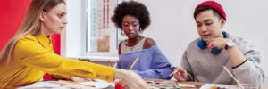 3 young adults at a group art with Creative Ventures Gallery